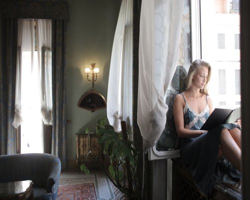 A calm reading place near a window in an Italian apartment